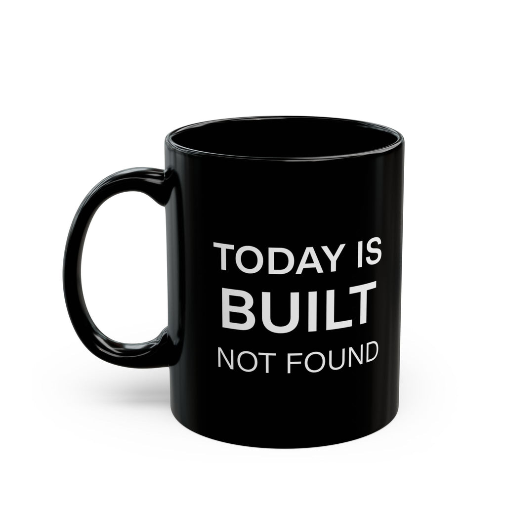 Black mug with 'Today is Built, Not Found' text on a white background