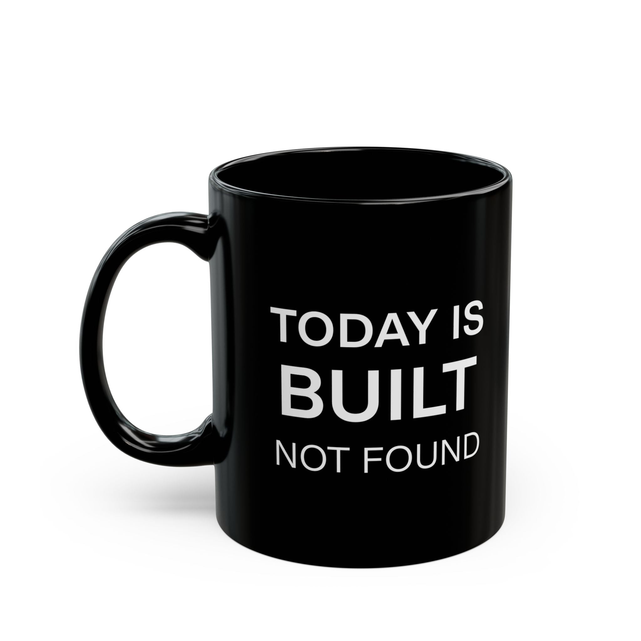 Black mug with 'Today is Built, Not Found' text on a white background