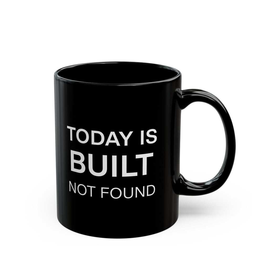 Black mug with 'Today is Built Not Found' text on a white background