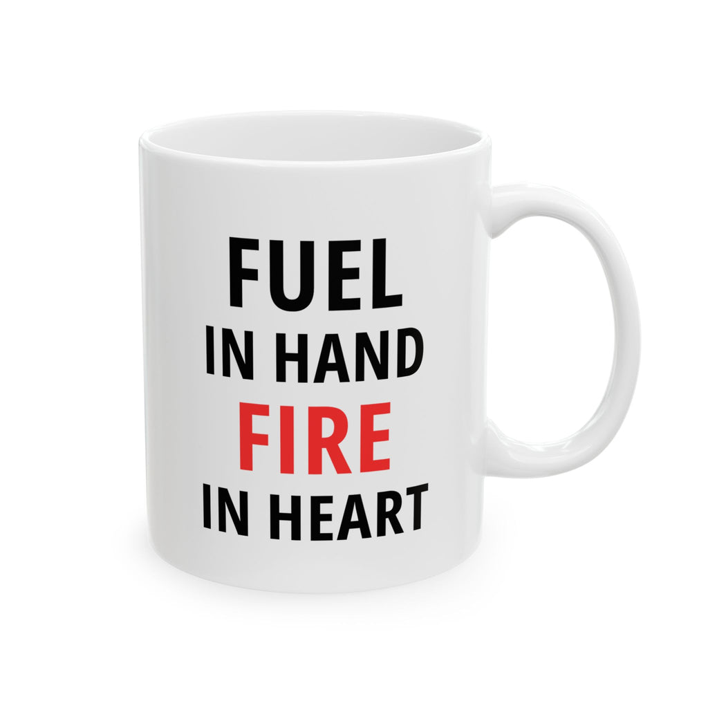 White mug with motivational text 'FUEL IN HAND FIRE IN HEART' on a white background