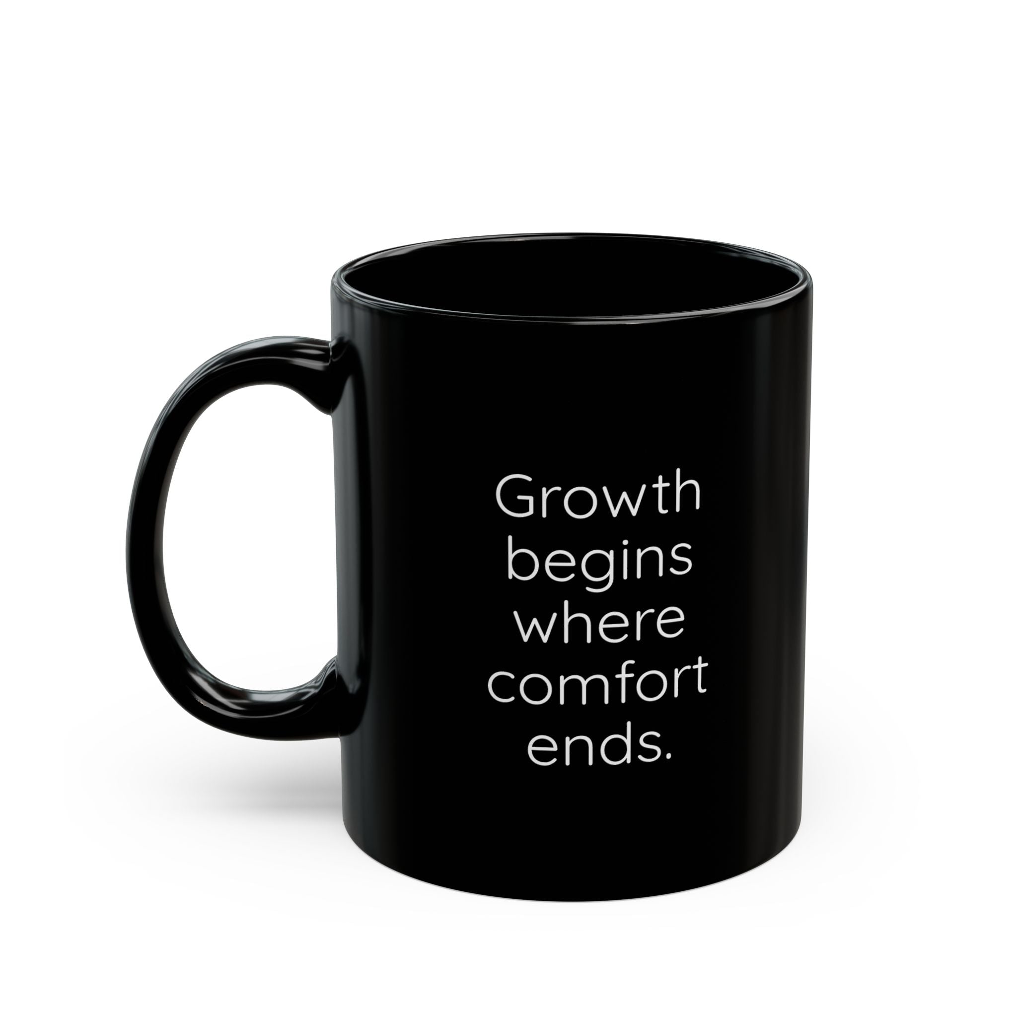Black mug with motivational quote on a white background