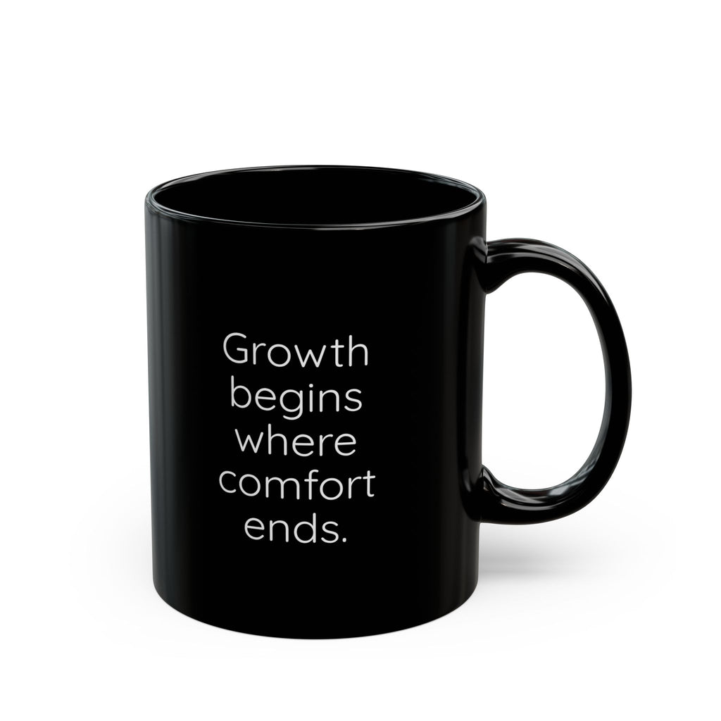 Black mug with motivational quote on a white background