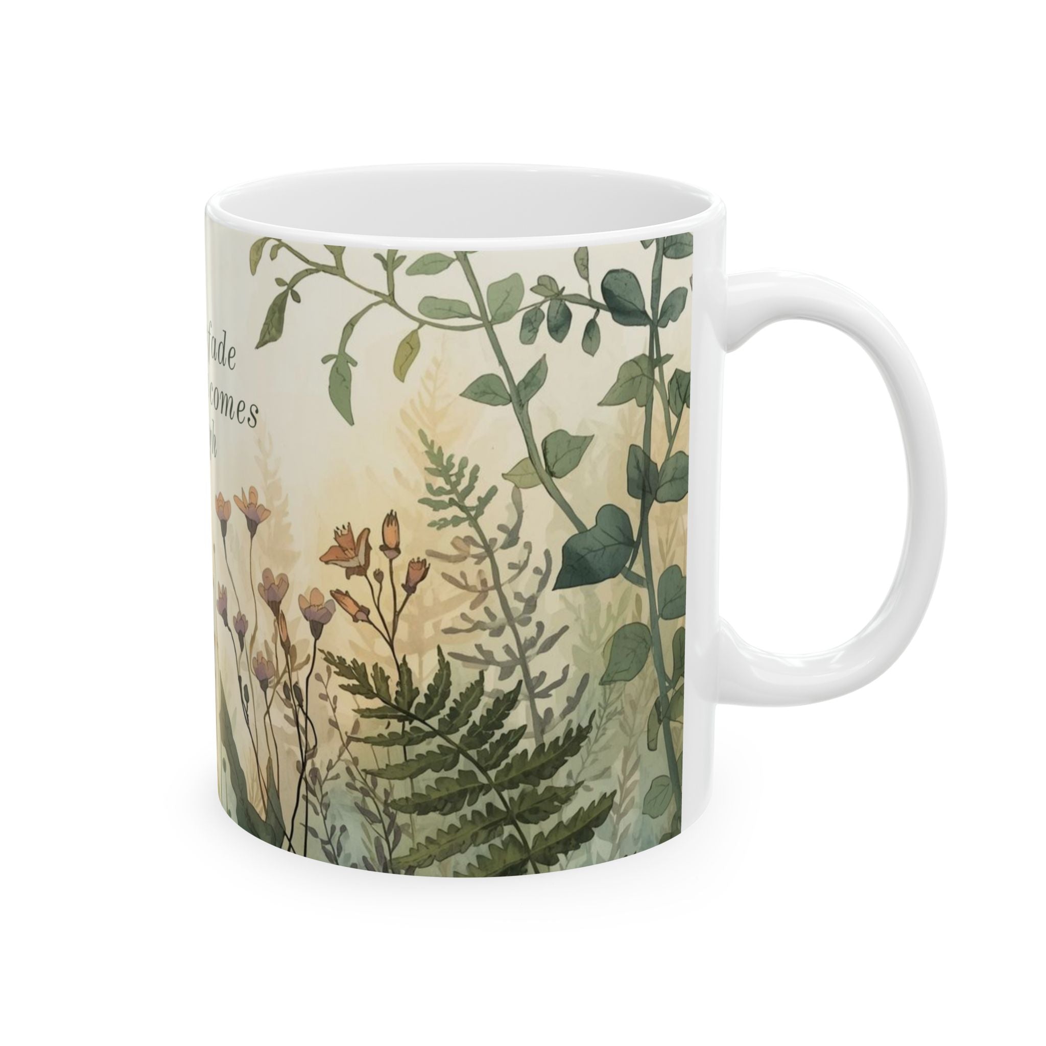 White ceramic mug with botanical design on a white background