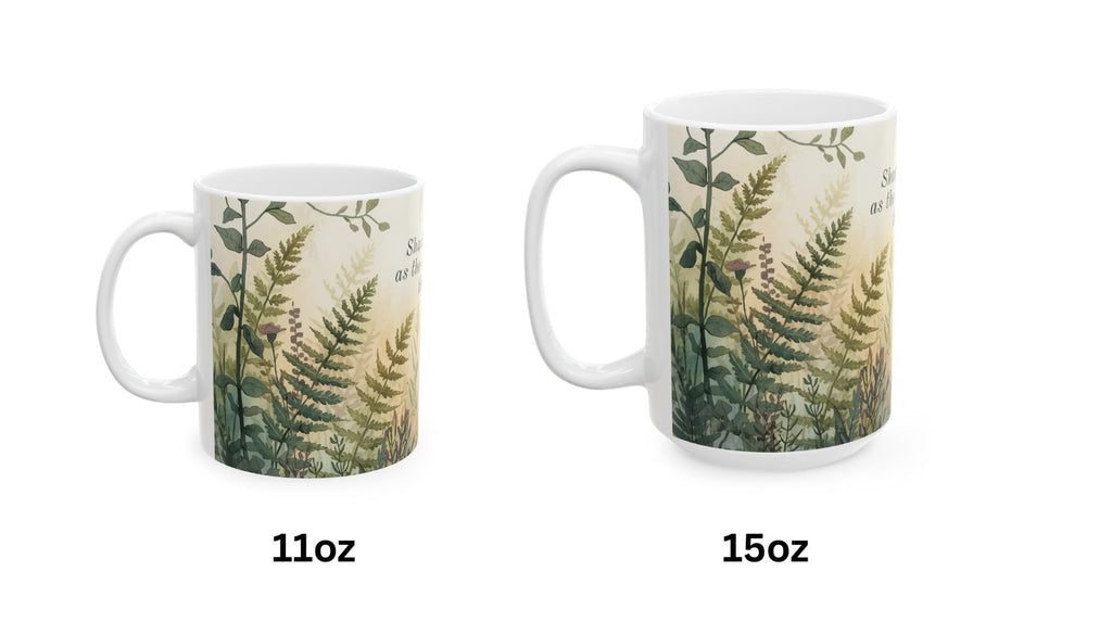 Two ceramic mugs with fern designs, one labeled 11oz and the other labeled 15oz, on a white background.