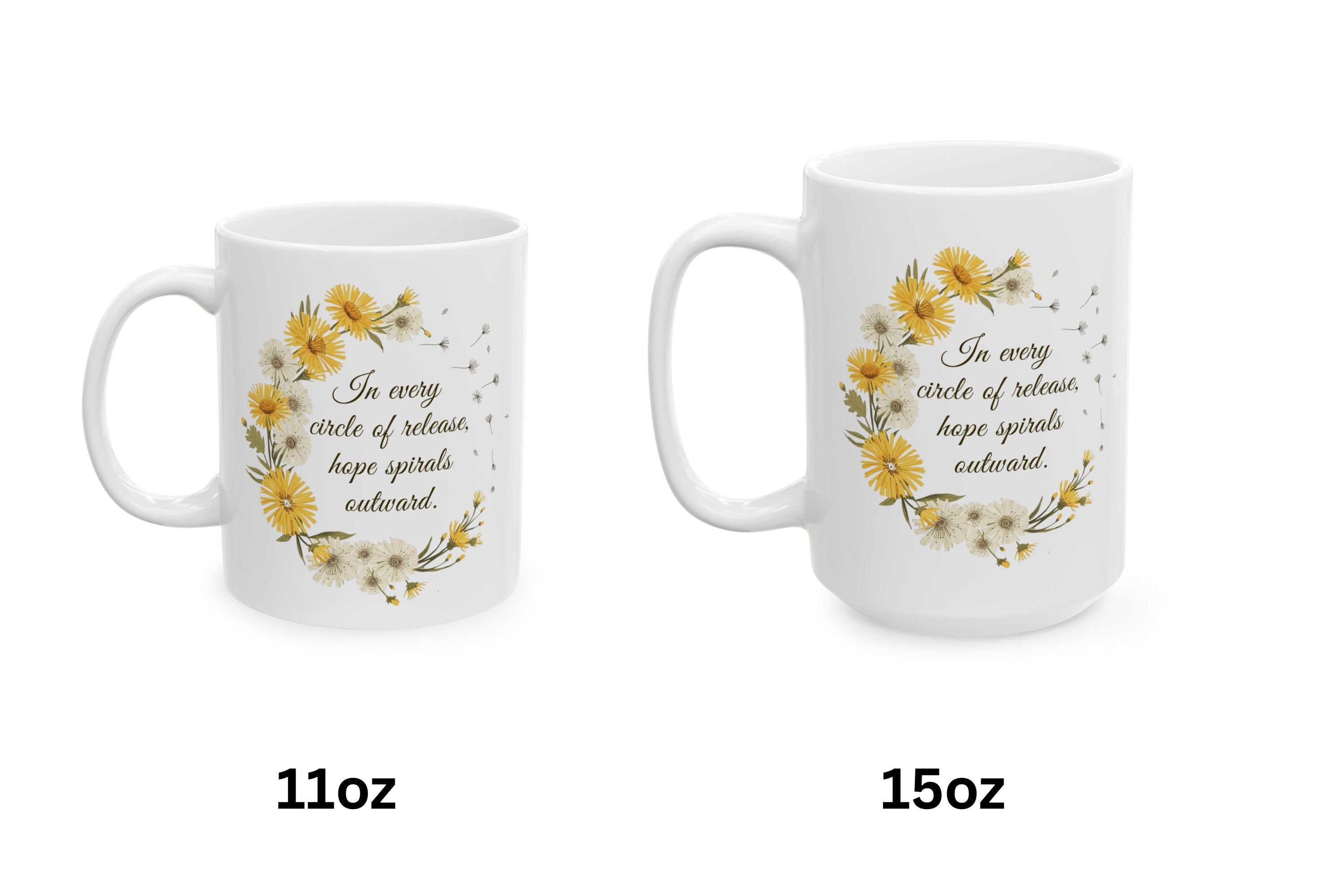 Two white ceramic mugs with dandelion wreath designs and uplifting quote on a white background