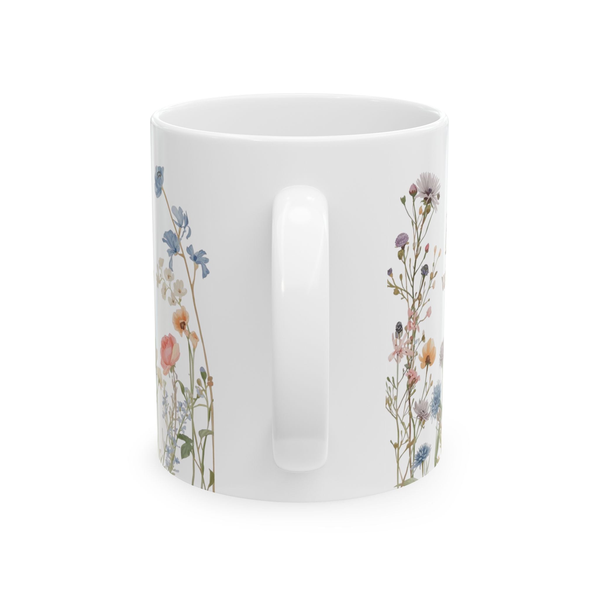 White mug with floral designs on a white background