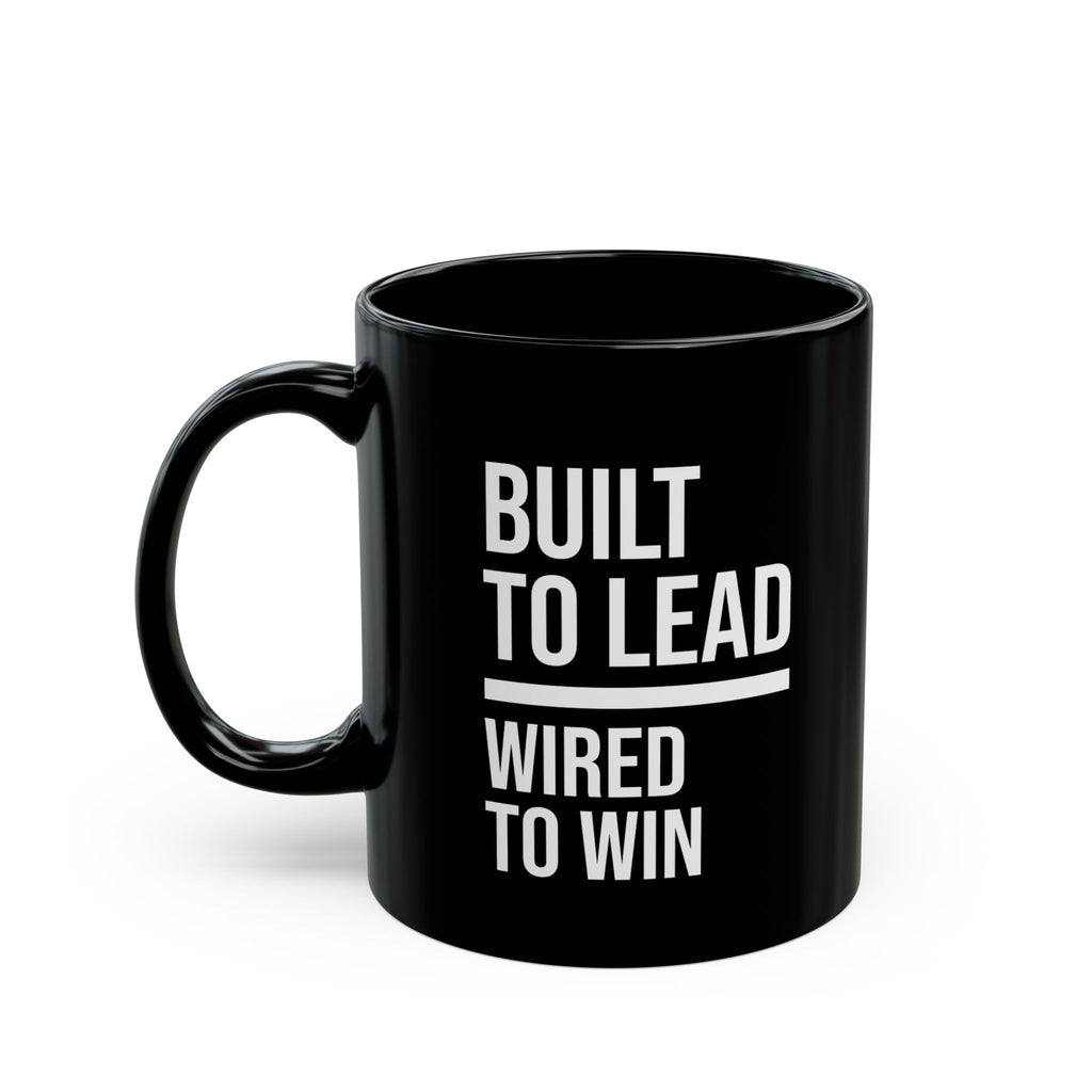 Black mug with 'Built to Lead, Wired to Win' text on a white background