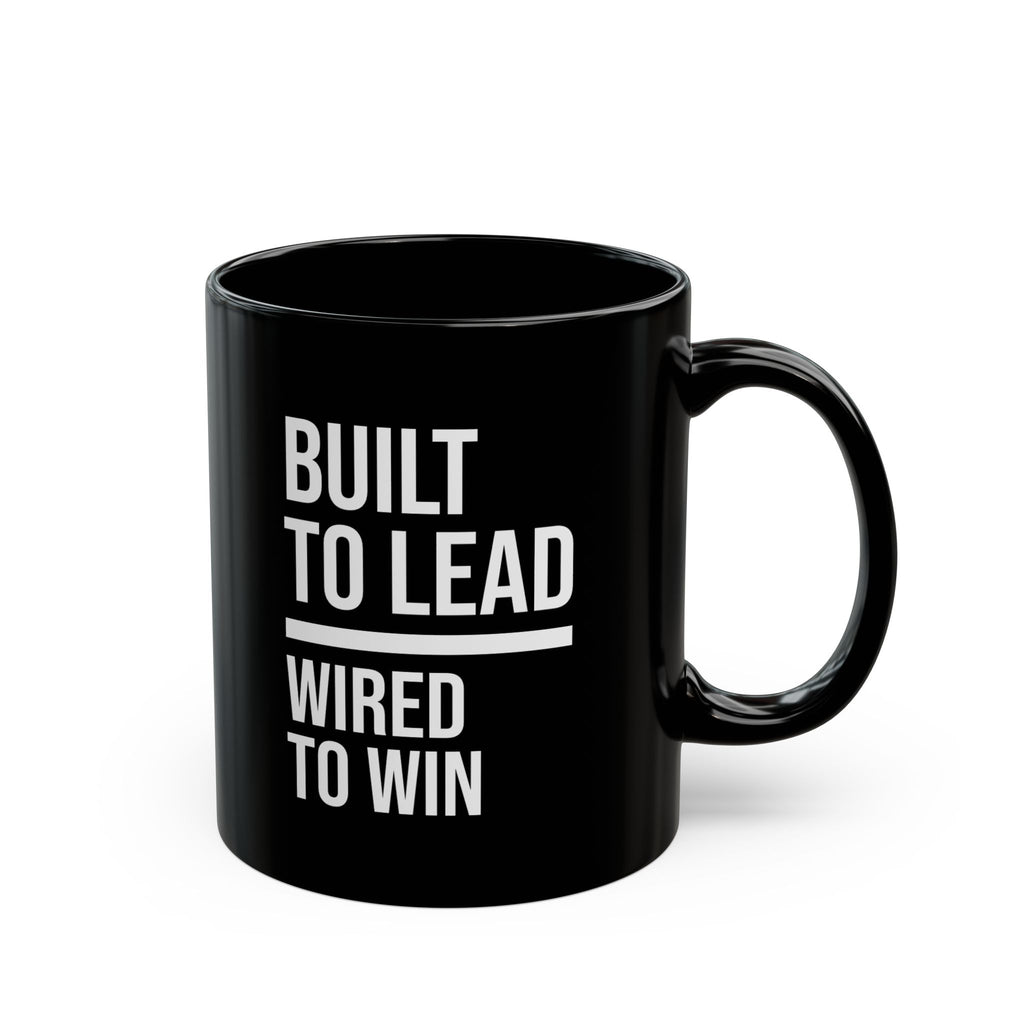 Black mug with 'Built to Lead, Wired to Win' text on a white background