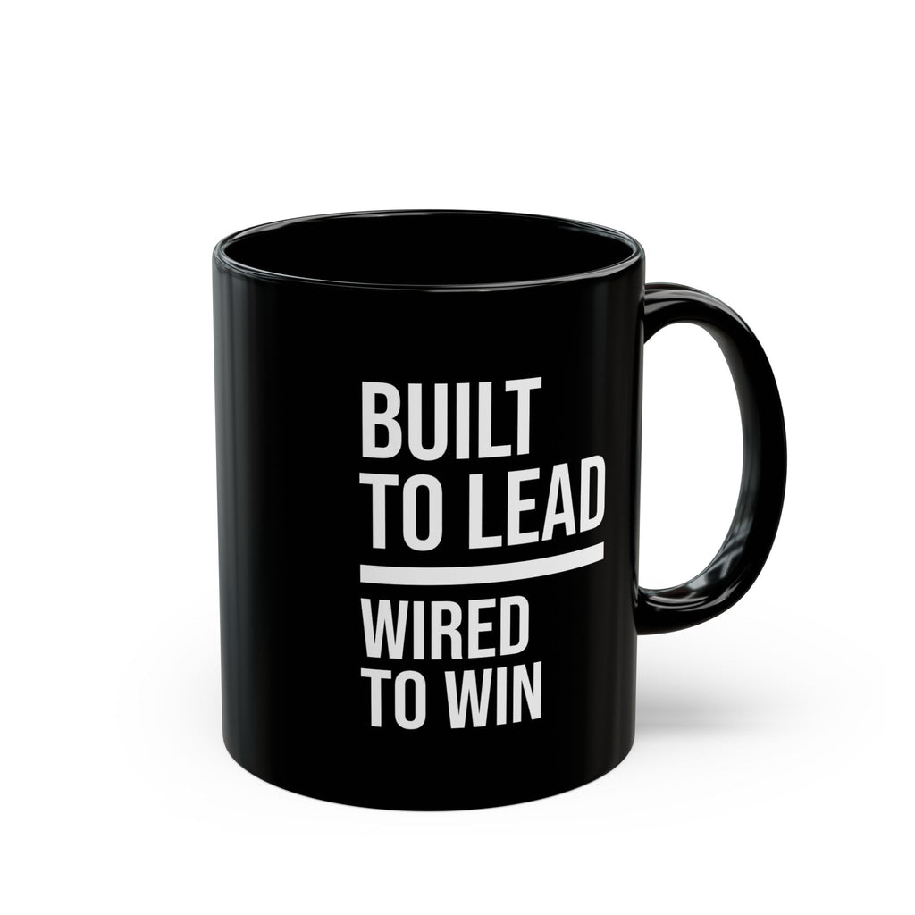 Black mug with motivational text 'Built to Lead, Wired to Win' on a white background